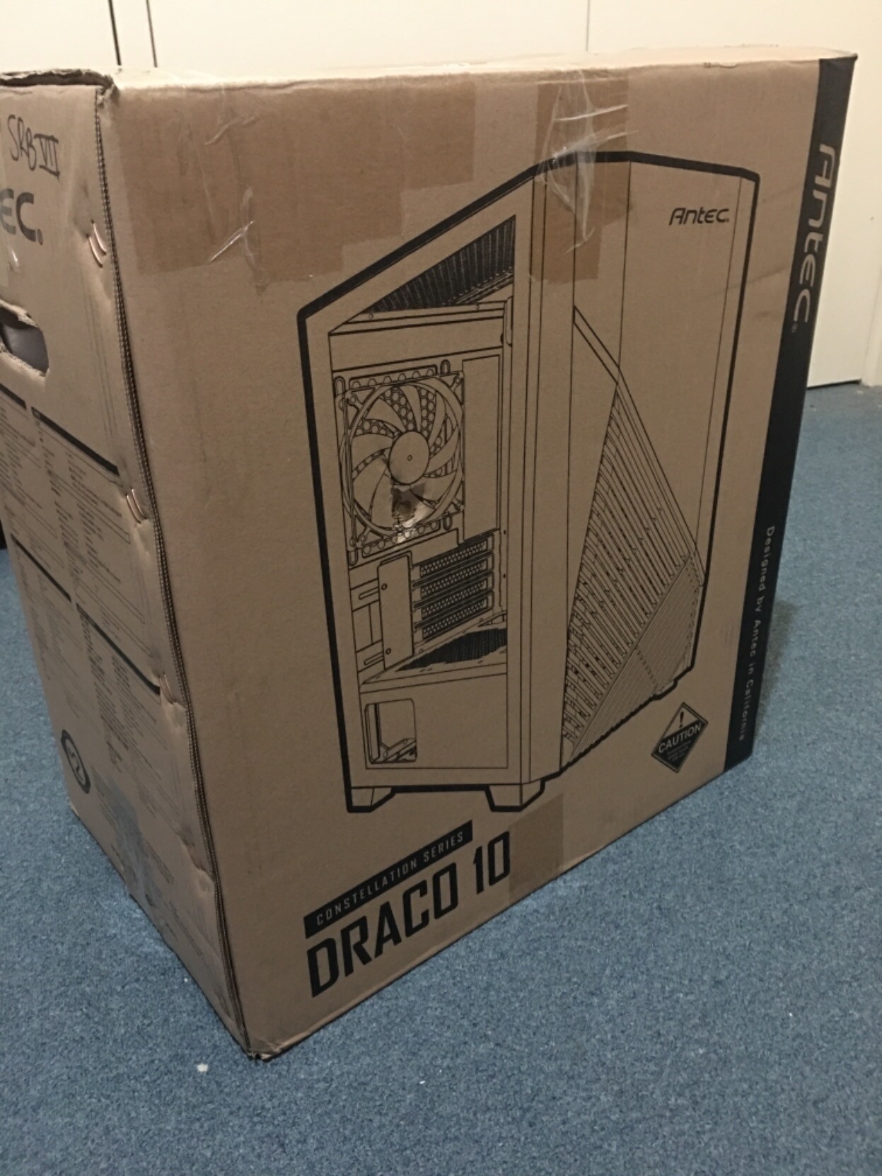 The box the Packard Bell arrived in. It is a box to a Antec Draco 10